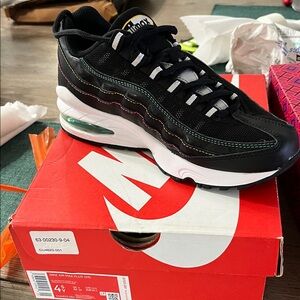 Nike Air Max Plus Black and White Athletic Shoes